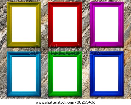 Colored frames with copy-space on a stone background