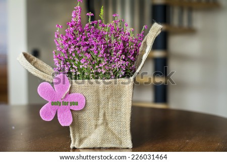 beautiful pink  flower with thank you gift card packed in canvas bag