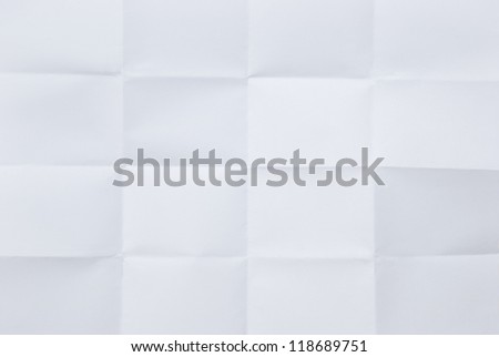 white sheet of paper folded in sixteen