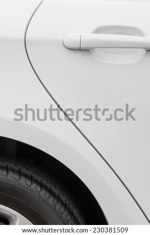 door and tyre for a white car