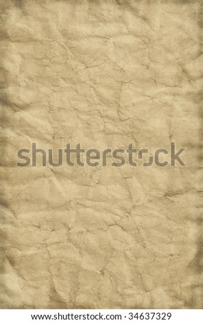 Old grungy and creased paper background.