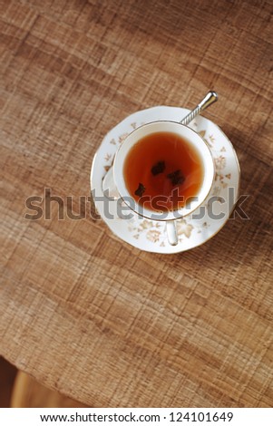 traditional tea on wooden cafe table