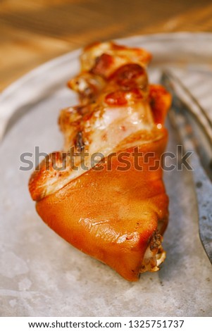 pork shank grilled and smoked in the tin plate