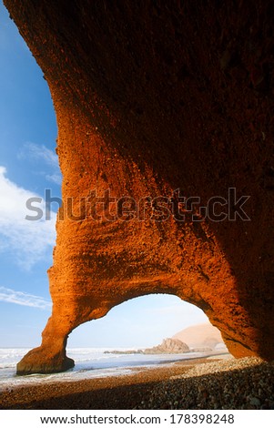 Legzira dramatic natural stone arches reaching over the sea, Atlantic Ocean, Morocco, Africa