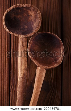 antique vintage wooden spoon on old wooden table in rustic style