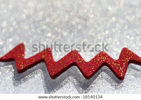 glitter sparkles dust with red decoration on background