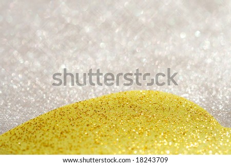 gold and white glitter sparkles dust background