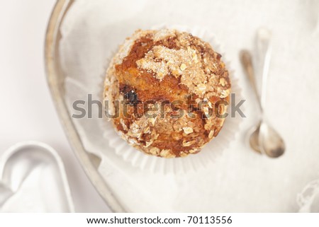 healthy muffin with cake tins and spoons, shallow dof