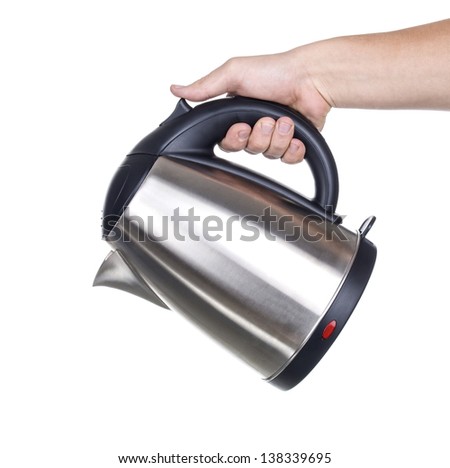 Electric kettle in hand isolated on white
