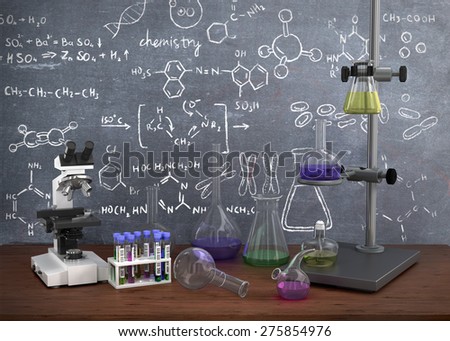 Laboratory chemical test tubes and objects on the table with chemistry draw on whiteboard.