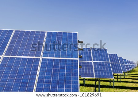 Rows of solar panels in small solar power plant