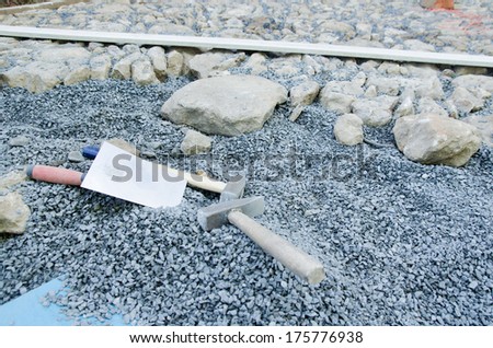 Construction of historic looking cobblestone pavement on the yard
