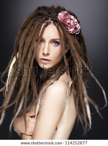 Fantastic creative fashion woman mod with dreadlocks - beauty glamour hairstyle