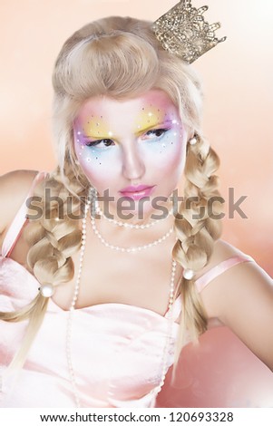 Retro Style. Beautiful Princess with Gold Crown - Blond Braid Hair