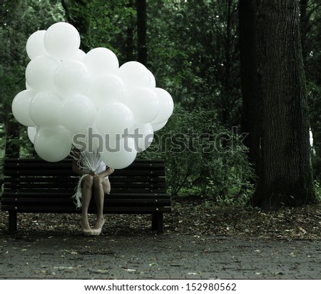 Sentimentality. Nostalgia. Lonely Woman With Air Balloons Sitting On Bench In The Park