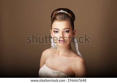 Exquisite Auburn Woman with Diadem. Updo Hairstyle