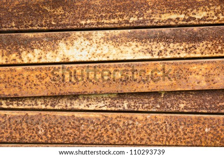 rust on surface of stack metal bar