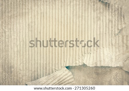 mix up of grunge background and torn corrugated paper