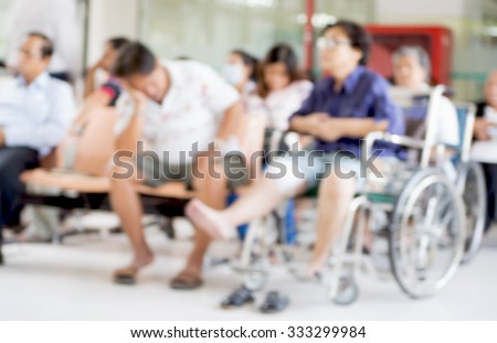 Blurred image of patient waiting for see a doctor at the hospital