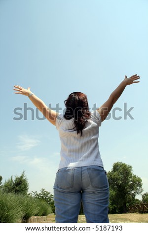 girl with arms wide open