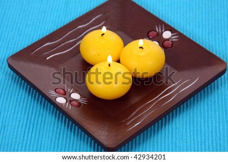 candles and massage stones in a calm zen spas
