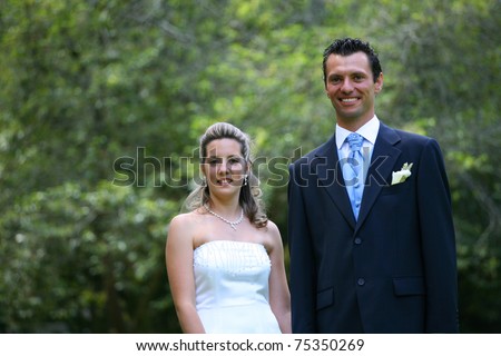 stock photo bride and groom wedding day in the park