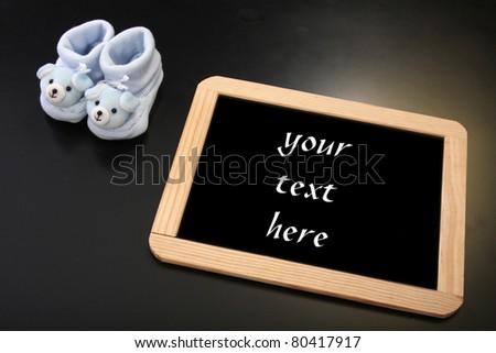 publicity board with space to put your baby name and blue clothes