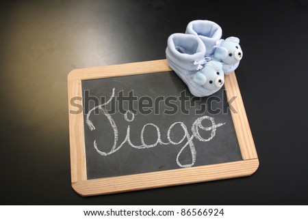 publicity board with space to put your baby name and blue clothes