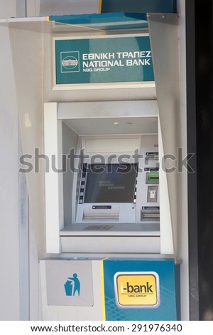 GREECE, Thessaloniki JUNE 29, 2015:  An automated teller machine (ATM) outside a closed national bank. Greek banks will stay closed for six days, and capital controls will be imposed when they reopen.