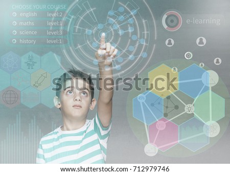 E-learning and futuristic education technology concept with little school boy using digital hud interface and icons. (Image with mixed digital effects)