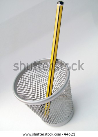 A pencil in a mesh steel staitionary basket
