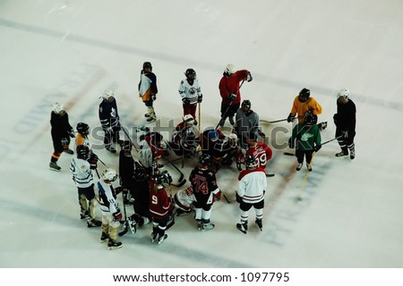 A team of junior ice hockey players in practice