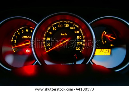 stock photo A shot of the car dashboard glowing while stationary