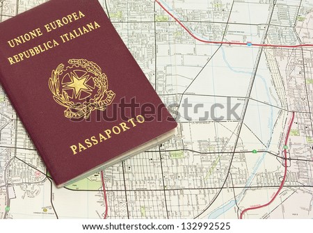 italian passport on a map