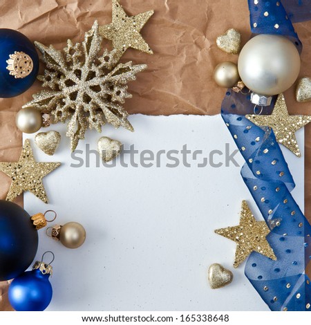 Christmas background with blue baubles and glittery ornaments