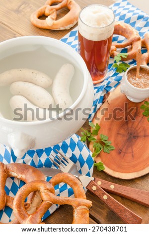 Bavarian white sausages with sweet mustard and pretzels