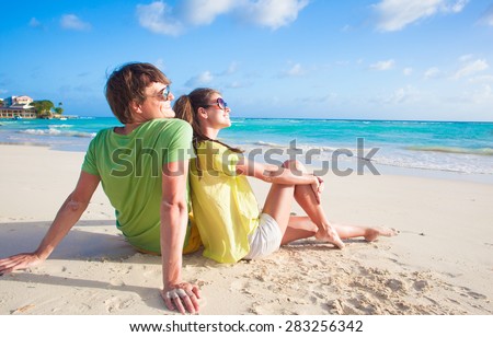 young family having fun at beach. remote tropical beaches and countries. travel concept