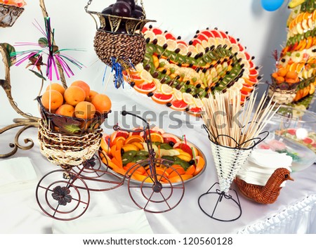 fruit buffet with fruit  heart and fruit pyramid heart