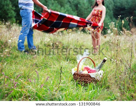 Happy Couple Having Romantic Picnic Together Outside
