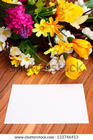 gift card with artificial flowers