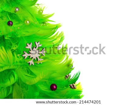 Christmas tree made of feathers isolated on white background