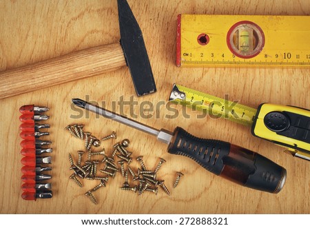 construction concept  Set of manual tools on a wooden boards background