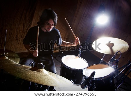 drummer playing his kit