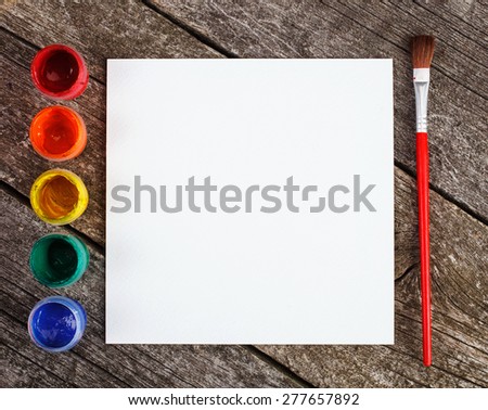 art paints for painting and brush on  vintage wooden background