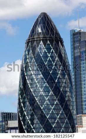 LONDON - AUGUST 11. View of Gherkin building (30 St Mary Axe) in London on August 11, 2013. Gherkin - iconic symbol of London, one of city's most widely recognized examples of modern architecture.