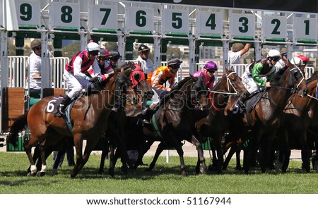 MELBOURNE - MARCH 13: Horses jump from the starting stalls in the Roy Higgins Quality, won by Elmore at Flemington on March 13, 2010 - Melbourne, Australia.