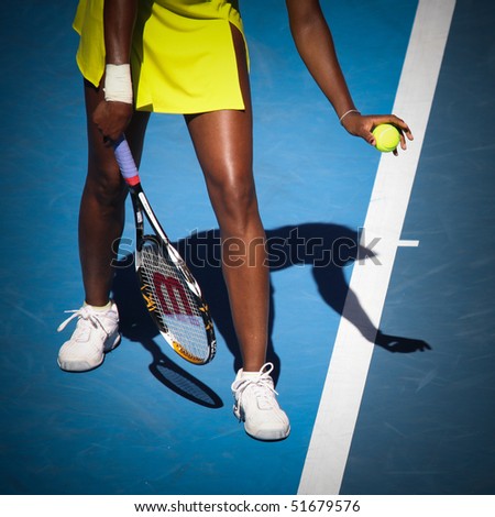 MELBOURNE, AUSTRALIA - JANUARY 23: Venus Williams serves during her third round match against Casey Dellacqua during the 2010 Australian Open on January 23, 2010 in Melbourne, Australia