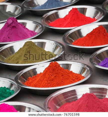 Coloured powders at market in Orchha, India