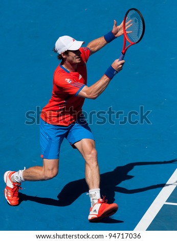 MELBOURNE - JANUARY 25: Andy Murray of Great Britain in his quarter final win over Kei Nishikori of Japan at  the 2012 Australian Open on January 25, 2012 in Melbourne, Australia.