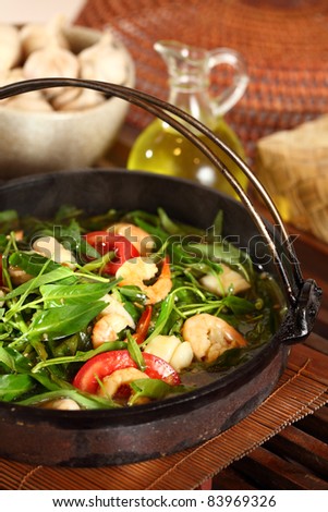 Delicious and healthy seafood water spinach served in a hot plate